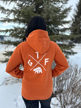Load image into Gallery viewer, burnt orange unisex hoodie with gtf outside cross logo with bear, gtfo
