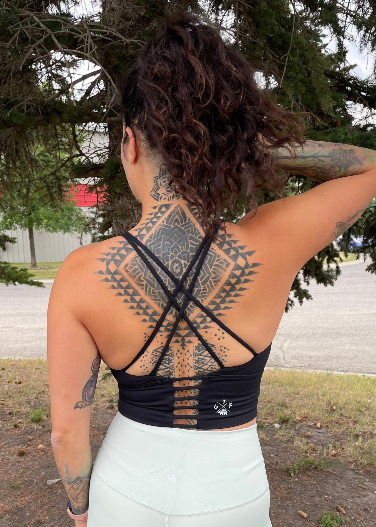 cross back sports bra top. gtf outside. gtfo.