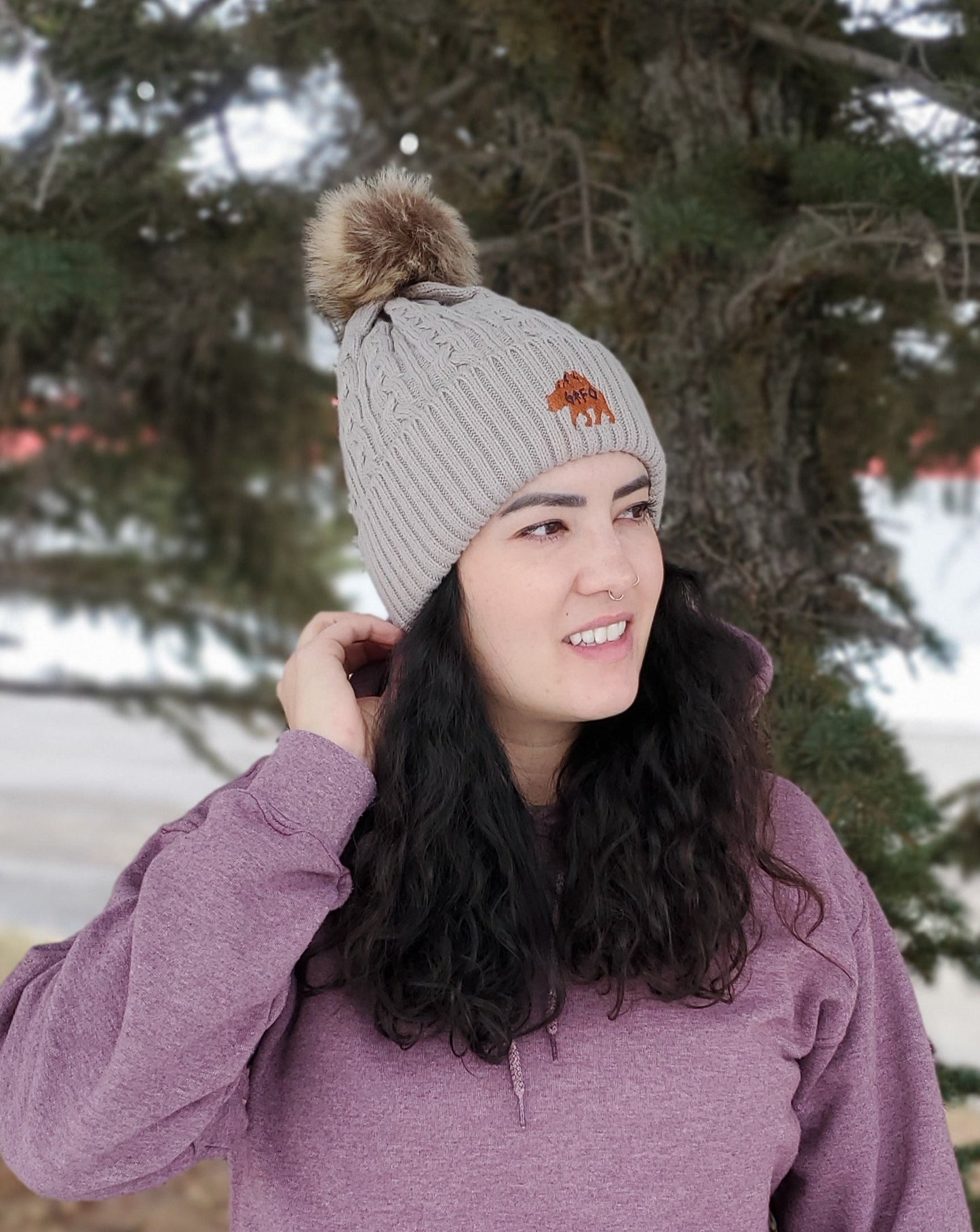 taupe pom pom toque with grizz gtfo logo, gtf outside