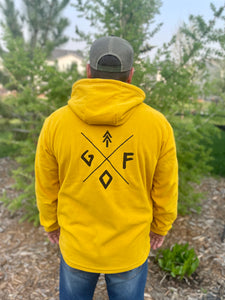 mustard yellow unisex fleece hoodie with embroidered gtfo logo. gtf outside. laides. men.