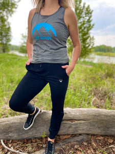 grey unisex tank with blue gtf outside logo with sun and mountains. ladies black athletic pants. joggers. men. gtfo.