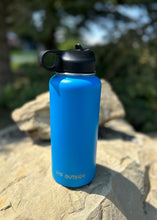 Load image into Gallery viewer, blue gtf outside water bottle with black lid
