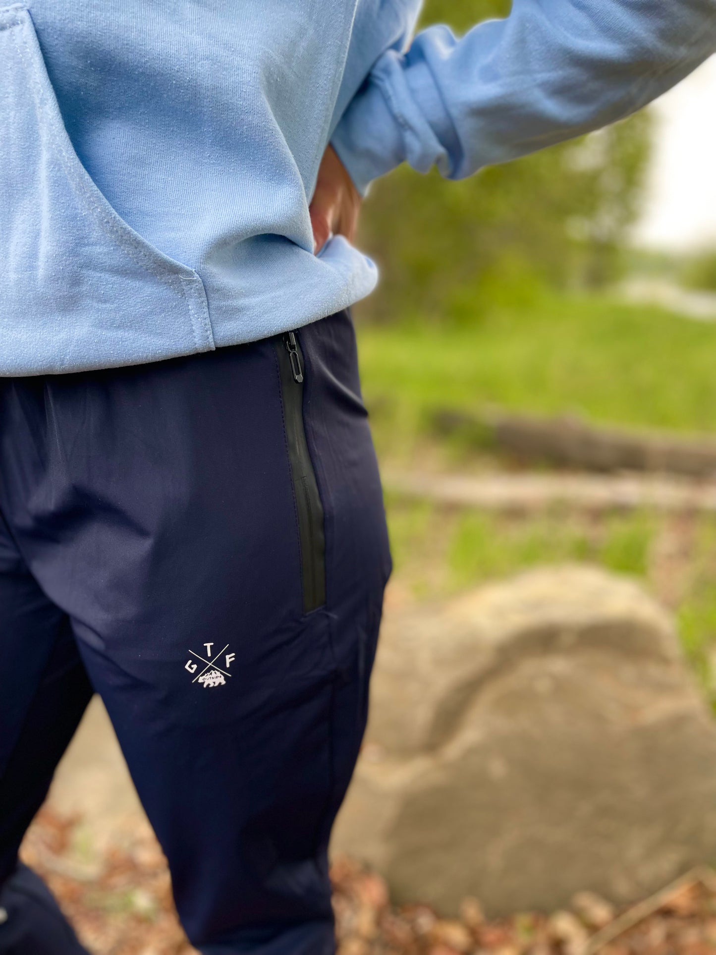 blue unisex joggers with gtfo logo. gtf outside.