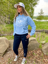Load image into Gallery viewer, light blue unisex hoodie with white be bold get the f outside logo with bear, mountains and trees. gtfo. gtf outside. ladies. men. unisex navy joggers with reflective detail and logo.
