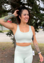 Load image into Gallery viewer, mint sports bra with gtf outside reflective logo. gtfo. ladies
