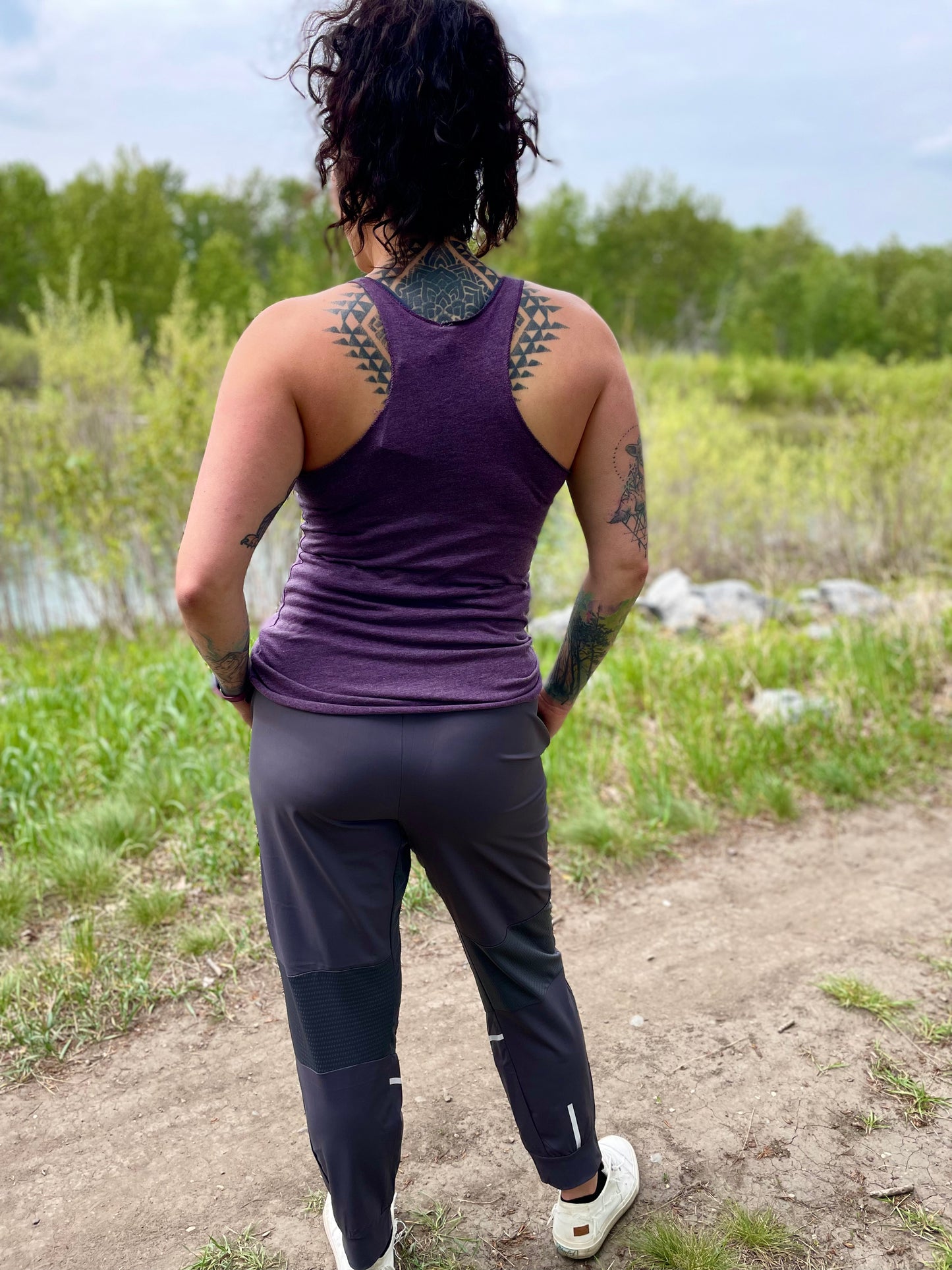 purple ladies racer back tank. grey unisex joggers. gtfo. gtf outside.